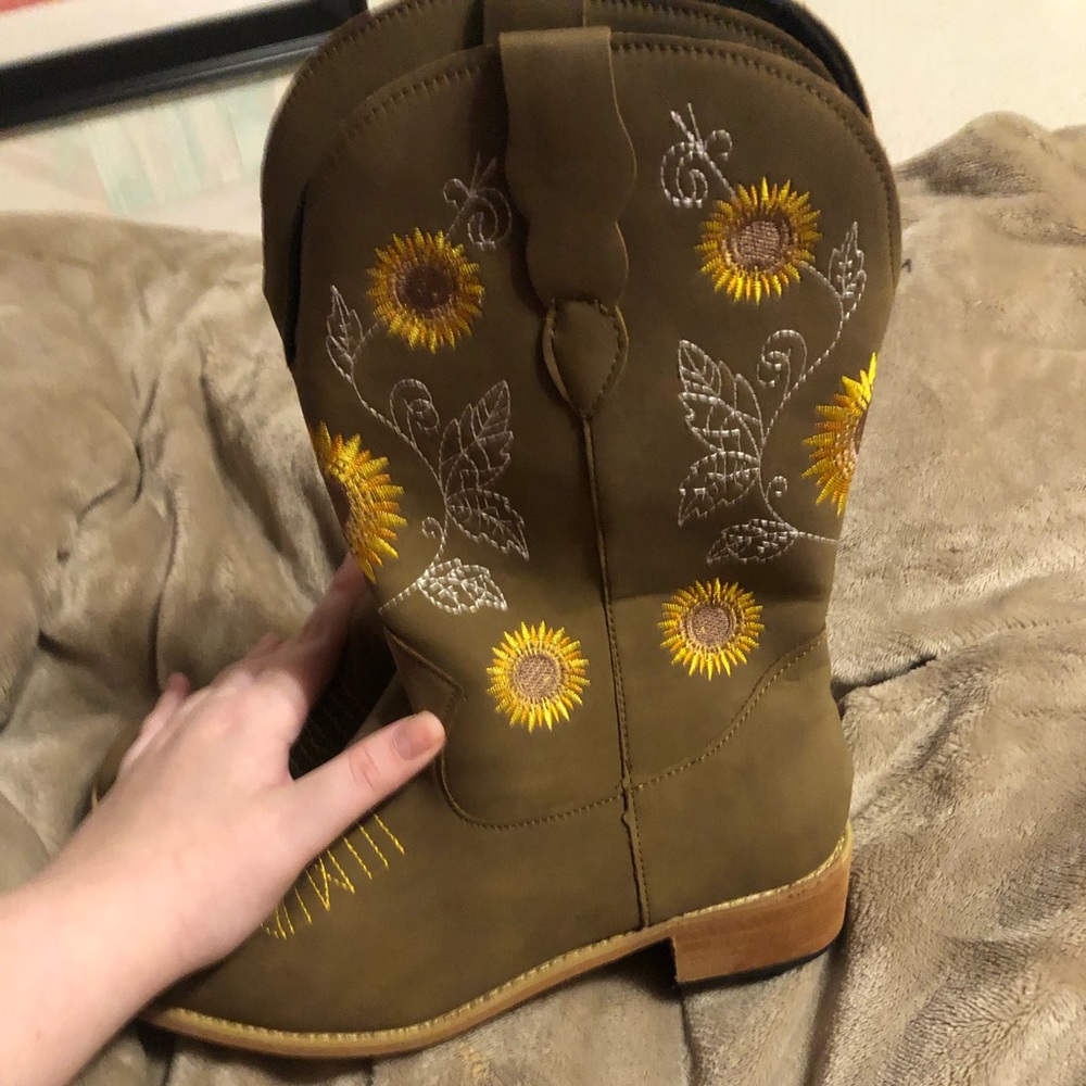 Pair of trendy sunflower cowboy boots